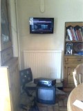 Wall mounted TV in domestic property in Finaghy, installed by Aerial Installations and Services, Belfast, Northern Ireland